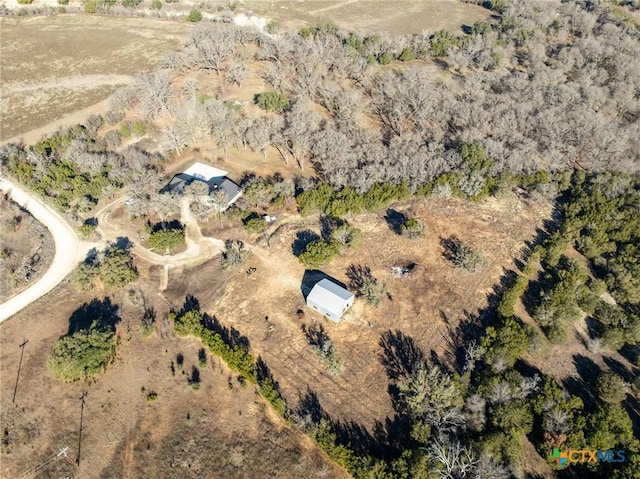 birds eye view of property featuring a rural view