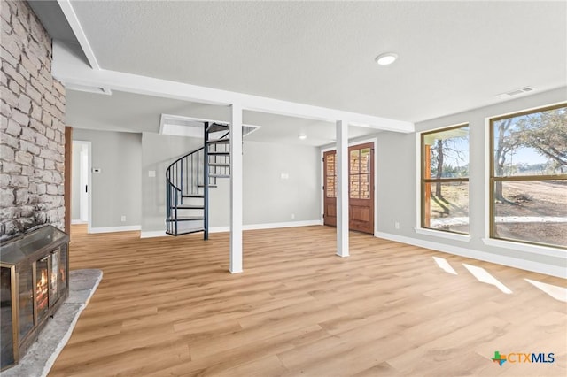 basement with light wood-type flooring