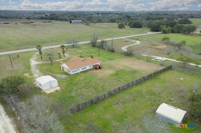 birds eye view of property featuring a rural view