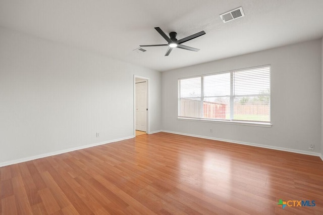 unfurnished room featuring ceiling fan and light hardwood / wood-style flooring