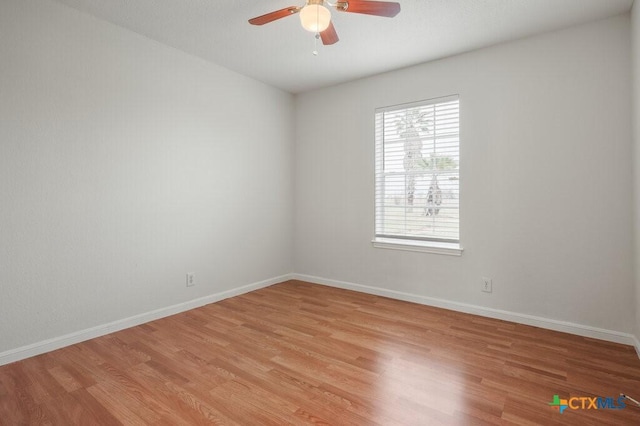 unfurnished room with ceiling fan and light hardwood / wood-style flooring