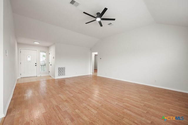 unfurnished living room featuring light hardwood / wood-style floors, lofted ceiling, and ceiling fan