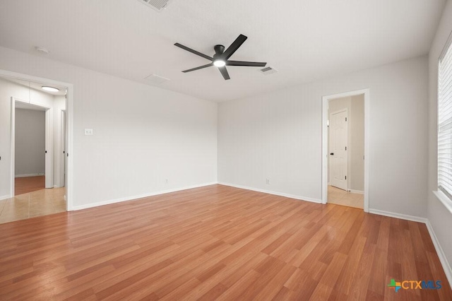 unfurnished room featuring ceiling fan and light hardwood / wood-style flooring