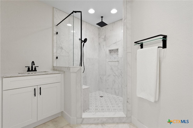 456 Magazine Ave, New Braunfels, TX 78130 - bathroom featuring a marble finish shower, vanity, and recessed lighting