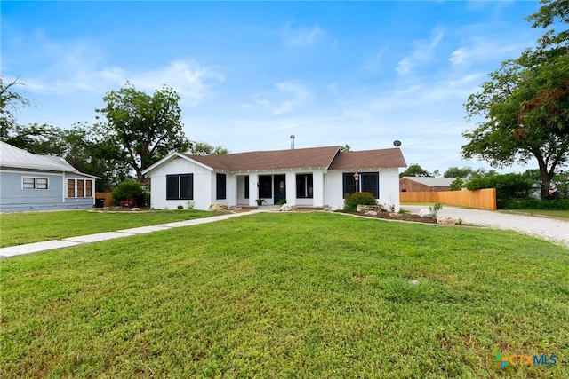 456 Magazine Ave, New Braunfels, TX 78130 - ranch-style house with board and batten siding and driveway