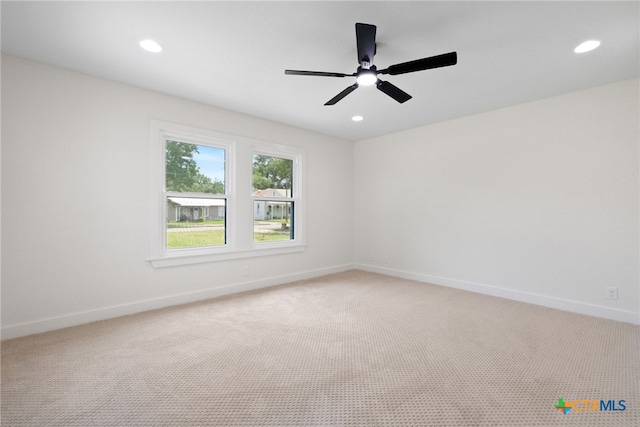 456 Magazine Ave, New Braunfels, TX 78130 - spare room with light carpet, recessed lighting, and a ceiling fan