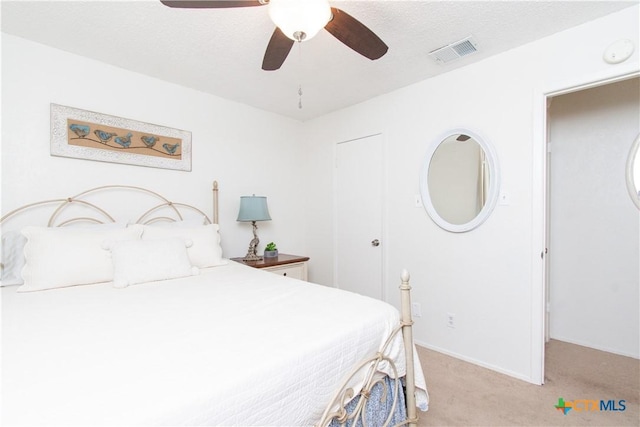 2210 Buckskin Trl, Temple, TX 76502 - bedroom with light colored carpet, ceiling fan, and baseboards