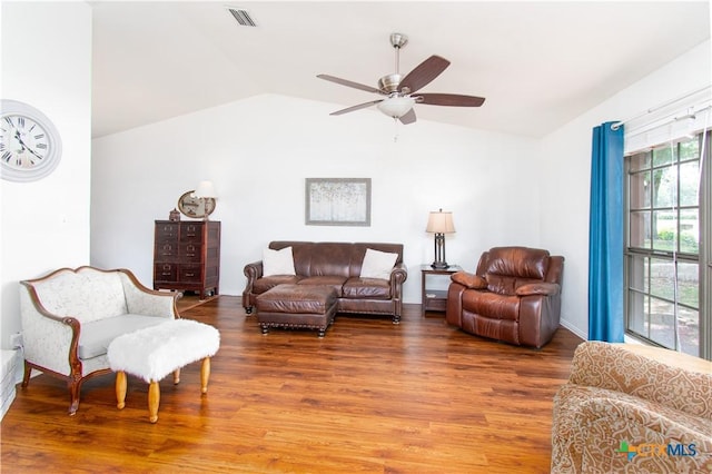 2210 Buckskin Trl, Temple, TX 76502 - living room with vaulted ceiling, wood finished floors, and a ceiling fan