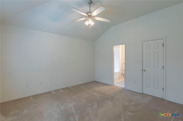 21 Artesian Dr, Belton, TX 76513 - spare room featuring vaulted ceiling, a ceiling fan, and light colored carpet