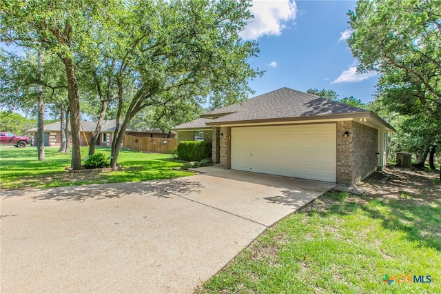 21 Artesian Dr, Belton, TX 76513 - ranch-style house featuring brick siding, concrete driveway, roof with shingles, and an attached garage
