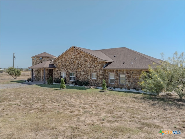 view of front of home with a front yard