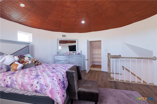 bedroom featuring wooden ceiling and dark hardwood / wood-style floors