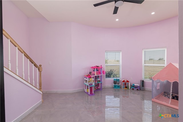 game room with ceiling fan