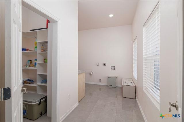 laundry area with gas dryer hookup