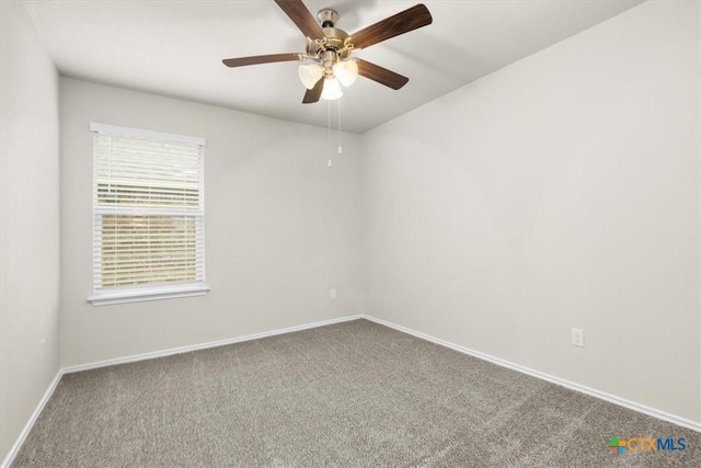 carpeted empty room featuring ceiling fan