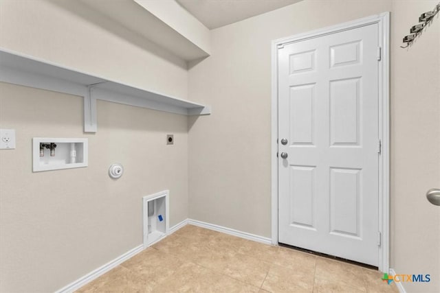 clothes washing area featuring hookup for an electric dryer, washer hookup, and hookup for a gas dryer