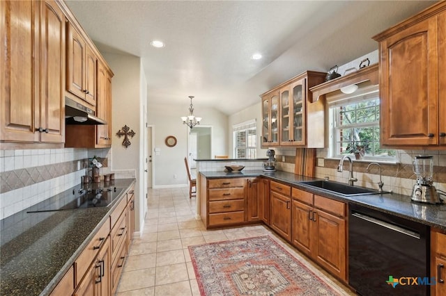 120 Oak Vis, New Braunfels, TX 78132 - kitchen with a sink, a chandelier, a peninsula, under cabinet range hood, and black appliances