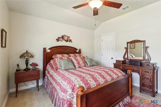 120 Oak Vis, New Braunfels, TX 78132 - bedroom with baseboards, ceiling fan, visible vents, and vaulted ceiling