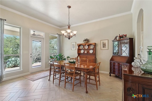 120 Oak Vis, New Braunfels, TX 78132 - dining room with an inviting chandelier, arched walkways, ornamental molding, and baseboards