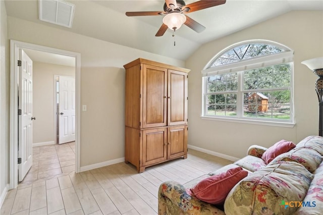 120 Oak Vis, New Braunfels, TX 78132 - living area with baseboards, visible vents, vaulted ceiling, and a ceiling fan