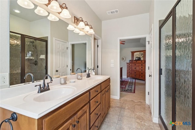 120 Oak Vis, New Braunfels, TX 78132 - full bathroom with visible vents, a sink, a stall shower, and double vanity