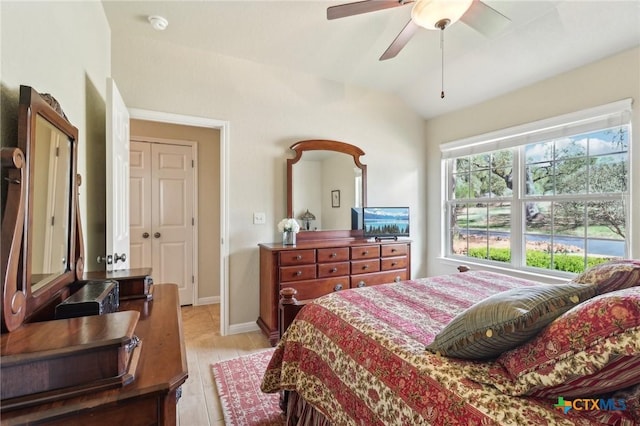 120 Oak Vis, New Braunfels, TX 78132 - bedroom with light wood finished floors, baseboards, lofted ceiling, and ceiling fan