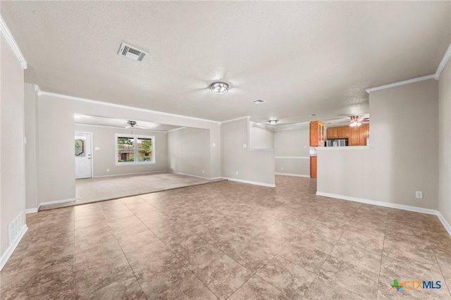 unfurnished living room featuring ceiling fan, ornamental molding, baseboards, and a textured ceiling