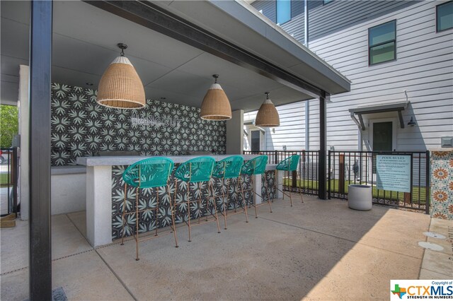 view of patio / terrace featuring a bar