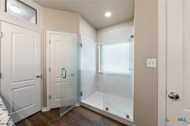 574 Rose Ln, Salado, TX 76571 - full bath with wood finished floors and a stall shower