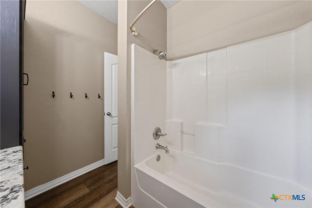574 Rose Ln, Salado, TX 76571 - bathroom with wood finished floors and bathing tub / shower combination