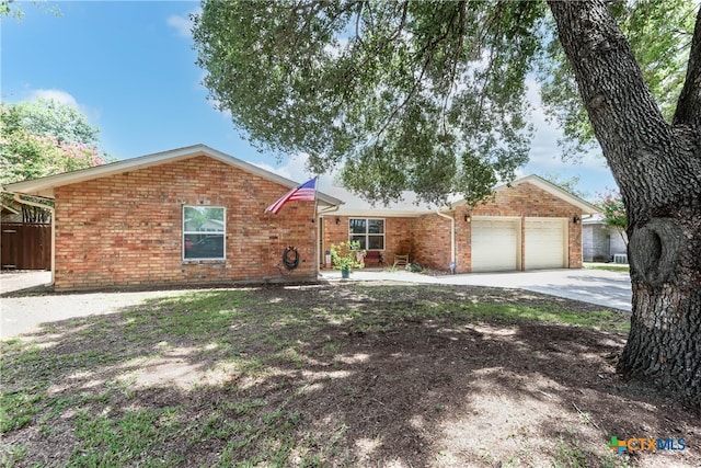 ranch-style home with a garage