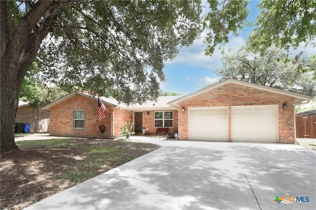 single story home with a garage