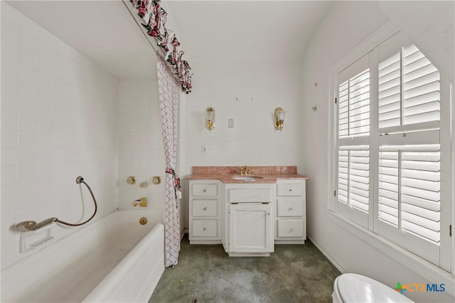 bathroom with vanity and a bathing tub