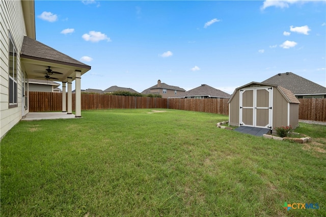 view of yard featuring a storage unit