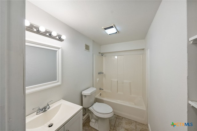 full bathroom featuring shower / tub combination, vanity, toilet, and tile patterned flooring