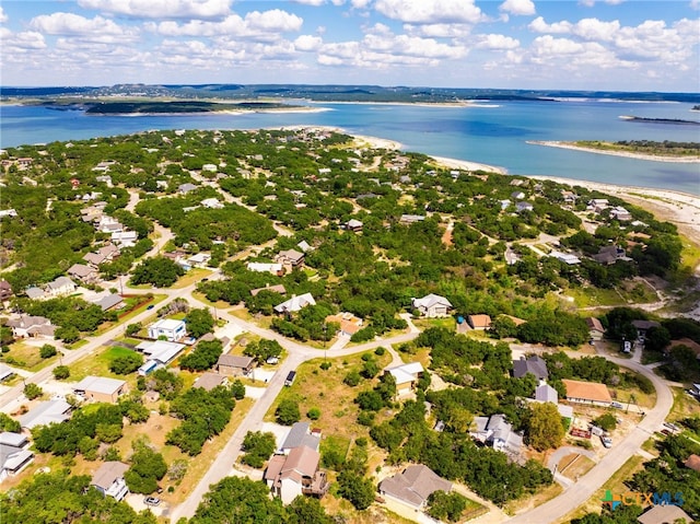 drone / aerial view with a water view