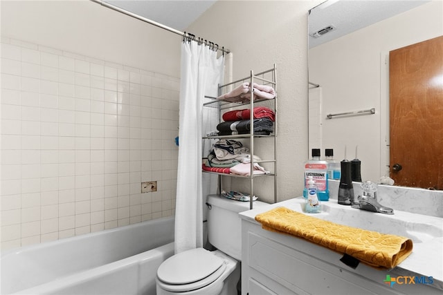 full bathroom with toilet, vanity, a textured ceiling, and shower / bathtub combination with curtain