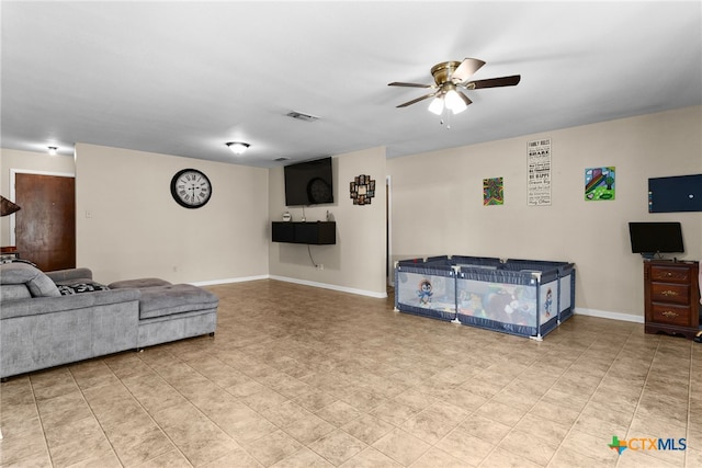 living room featuring ceiling fan