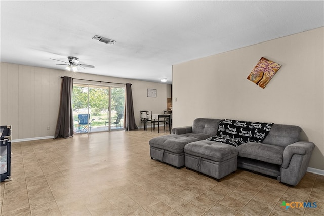 living room featuring ceiling fan