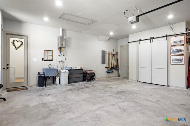 garage featuring tankless water heater, a garage door opener, electric panel, and sink