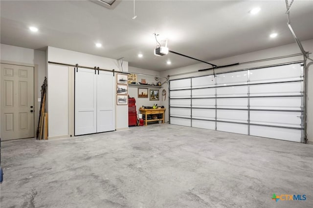 garage featuring a garage door opener