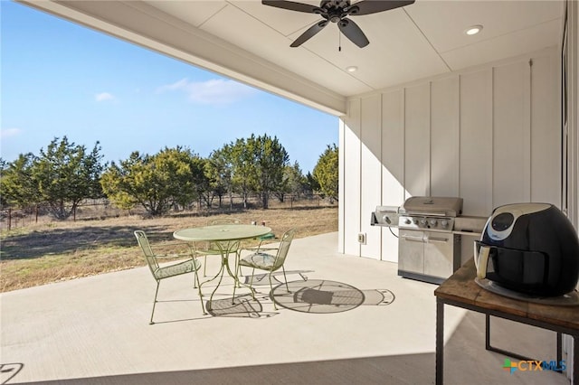 view of patio / terrace featuring ceiling fan and a grill