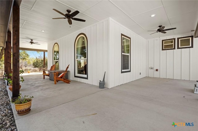 view of patio featuring ceiling fan