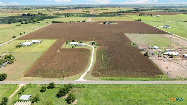 birds eye view of property featuring a rural view