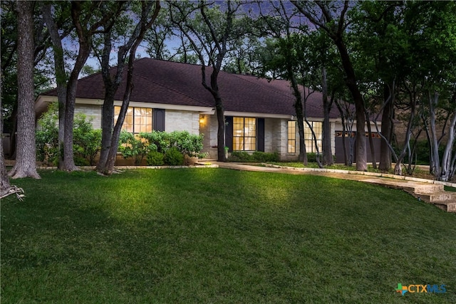 9215 Standing Creek Ln, San Antonio, TX 78230 - view of front of house with a front yard and roof with shingles