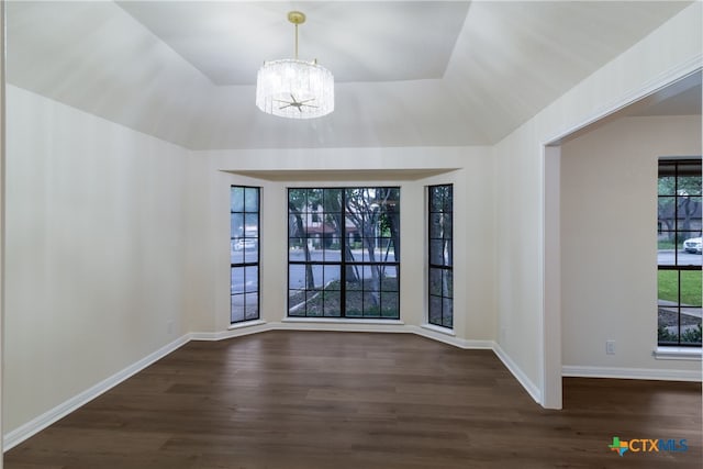 9215 Standing Creek Ln, San Antonio, TX 78230 - unfurnished dining area with a chandelier, dark wood-style floors, and baseboards