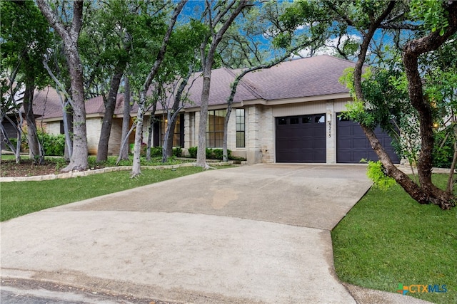 9215 Standing Creek Ln, San Antonio, TX 78230 - view of front of property with a garage, concrete driveway, roof with shingles, and brick siding