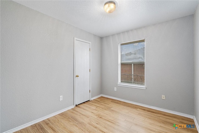 empty room featuring light wood-type flooring