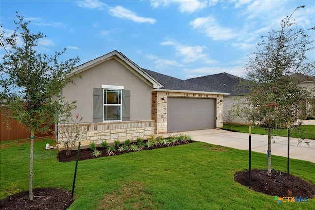 ranch-style home featuring a front yard and a garage