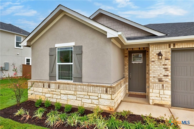 property entrance with a garage